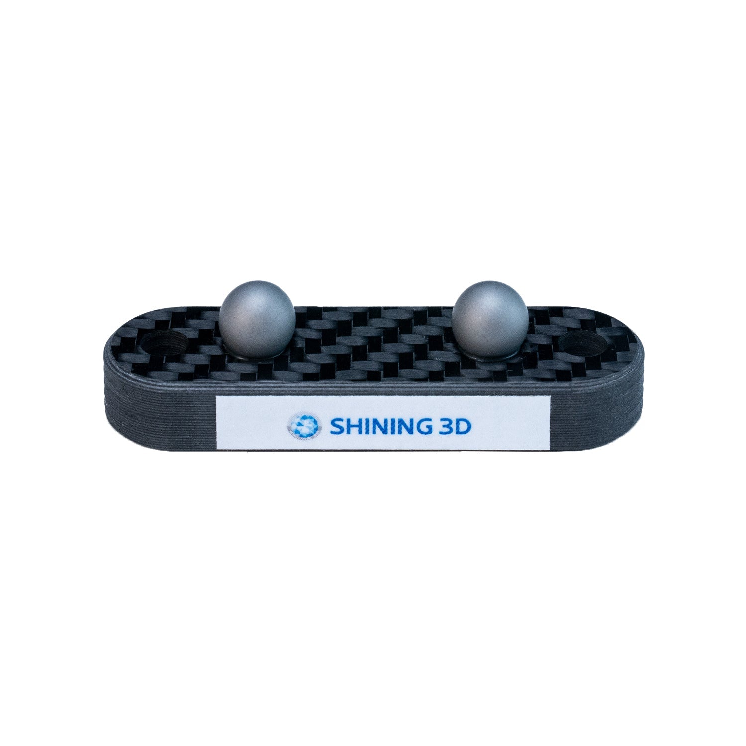 Front view of the 30mm Matte Ball Plate from SHINING 3D with two matte balls on a carbon fiber textured base, designed for precision calibration.